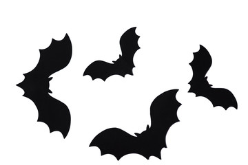Black bats on the white background