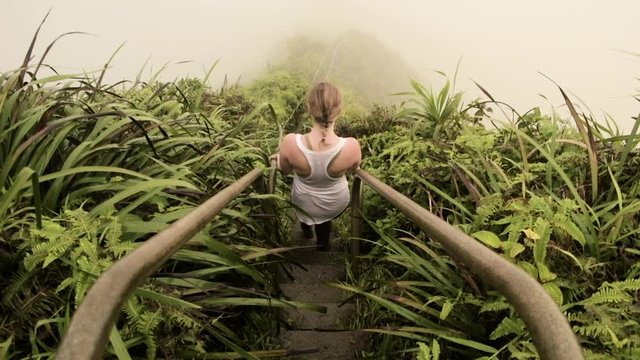 girl walking down stairs / stairway to heaven in Oahu, Hawaii