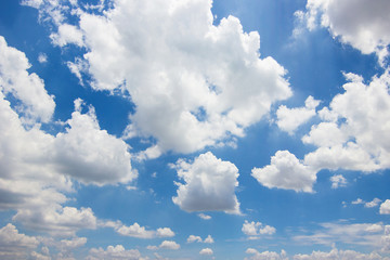 Transparent blue sky with clouds and atmospheric afternoon.