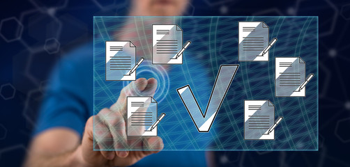 Man touching a document validation concept