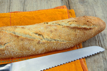 french baguette on a wooden table