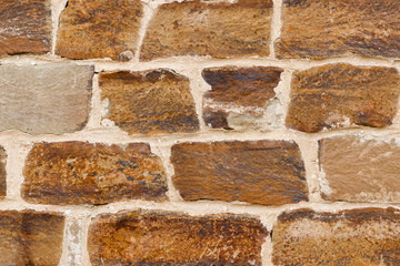 Texture of a antique stone wall. Old castle stone wall texture background. Stone wall as a background or texture.