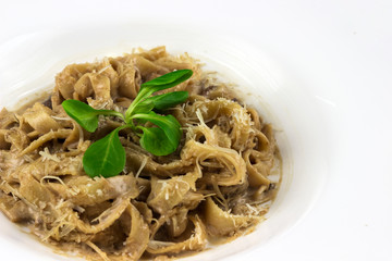 pasta with mazzarella cheese in a plate