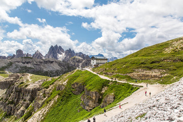 Dolomites, Italy - July, 2019: Amazing panoramic view from Tre Cime over the Dolomite's mountain chain