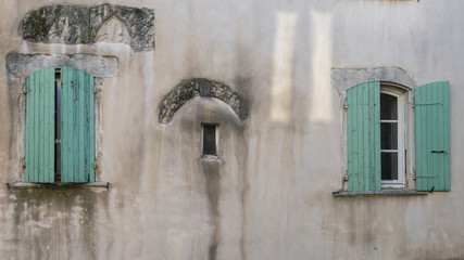 Fototapeta na wymiar Facade modified over time, Taulignan in Provence 