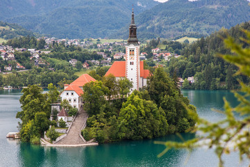 Bled, Slovenia - July, 2019: Lake Bled with St. Marys Church of Assumption on small island....