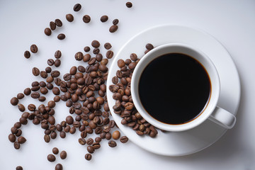 cup of coffee and coffee beans with space