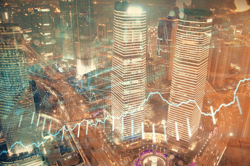 Financial chart on city scape with tall buildings background multi exposure. Analysis concept.