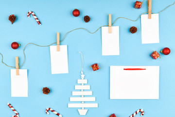 Christmas composition with various objects for writing. Studio shot over christmas background....