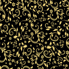 Seamless pattern with golden decorative elements of flowers and leaves on a black background.