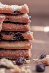 Raisin cookies on a wooden surface