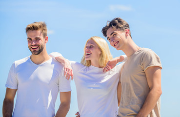 Sincere emotions. heaven concept. success heights. happy woman and two men. cheerful friends. friendship relations. family bonding and love. summer vacation. time to relax. group of people outdoor