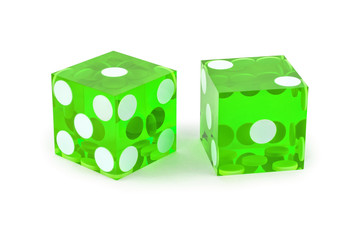 Two green professional game dice closeup isolated on a white background / one and two with a light shadow.