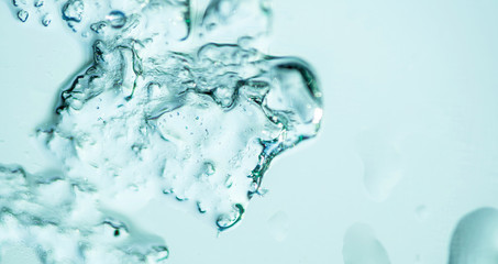 Frozen water. Snowflakes sparkling in the sun