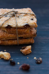 Biscuits with raisins on a dark background