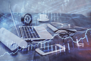 Forex Chart hologram on table with computer background. Double exposure. Concept of financial markets.