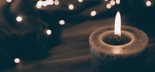 Christmas candle in dark retro style