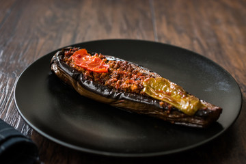 Karniyarik - Stuffed Eggplants, Aubergines with Ground Beef and Vegetables Baked with Tomato Sauce