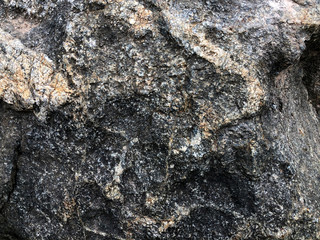 Granite texture - design lines gray seamless stone abstract surface grain rock background construction closeup details.