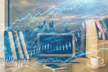 Double exposure of forex chart and work space with computer. Concept of international online trading.