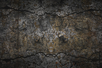 abstract creative texture using multi-exposure technique. Dark background with stone surface and cracks