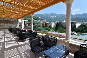 A Wicker chairs and table on the outdoor terrace
