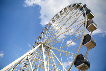 Ferris wheel against the sky with copy space