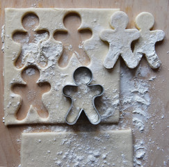 making Christmas cookies from dough