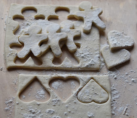 making Christmas cookies from dough