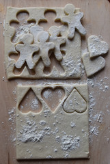 making Christmas cookies from dough