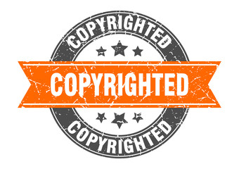 copyrighted round stamp with orange ribbon. copyrighted