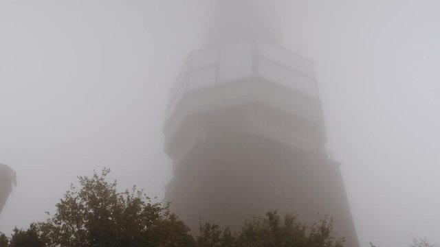 Low angle of Tower covered in heavy fog on grosser Feldberg, Hessen, Frankfurt