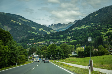 Austria - July, 2019: Country road in the alps in Austria