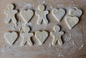 making Christmas cookies from dough