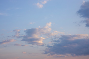Naklejka na ściany i meble fluffy clouds and sky background