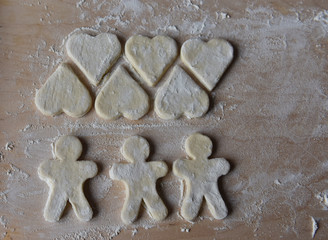 making Christmas cookies from dough