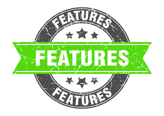 Fototapeta premium features round stamp with green ribbon. features