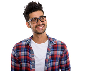 Portrait of young bearded Persian hipster man with eyeglasses