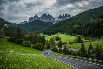 Dolomites, Italy - July, 2019: Famous best alpine place of the world, Santa Maddalena village with Dolomites mountains in background, Val di Funes valley, Trentino Alto Adige region, Italy, Europe