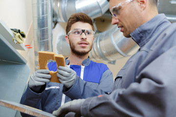 apprentice in a pipe factory