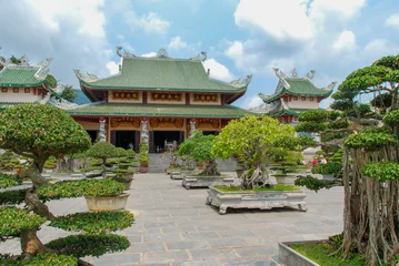 Fotobehang Bonsai Front of Linh Ung Pagoda with bonsai garden in Da Nang, Vietnam   © Ilona