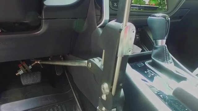 Car for disabled people. Hand operated vehicles for disabled people. Hand control driving adaptive equipment
