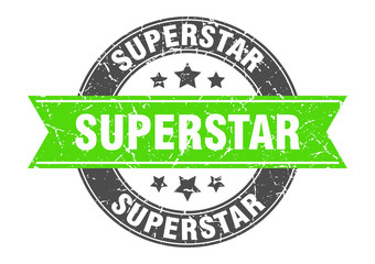 superstar round stamp with green ribbon. superstar