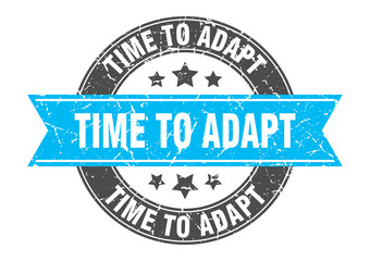 time to adapt round stamp with turquoise ribbon. time to adapt