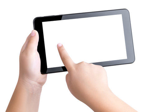 Closeup hands of white child holding  black tablet PC with white blank screen for text or picture isolated on white background.  Index finger of  right hand tap the left side of the smartphone screen.