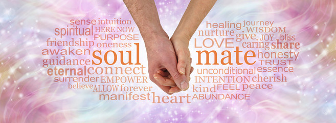 You and Me were spiritually meant to be - male and female hand in gentle embrace between the words SOUL and MATE surrounded by a relevant word cloud on a loving gentle pastel coloured background