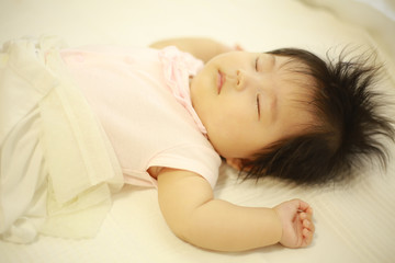 Obraz na płótnie Canvas 眠る赤ちゃん