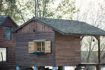 Fototapeta na wymiar cottage in forest near the river