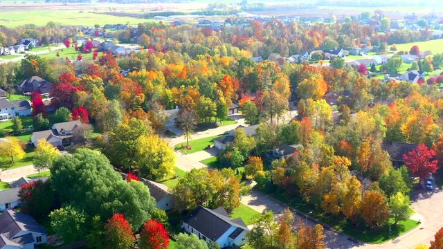 Beautiful neighborhoods, homes, Fall colors, colorful trees, aerial drone view.