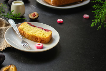 plum pie (delicious dessert, pastries with fruit) menu concept. food background. copy space. Top viev